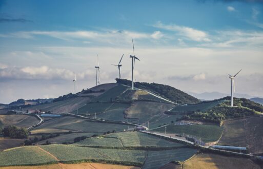 wind turbines to illustrate energy trading systems in PCI Energy Solutions blog post